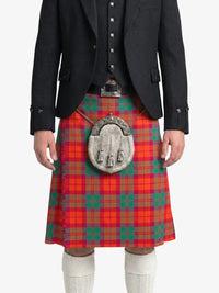 Person wearing a red tartan kilt with a silver sporran on a white background