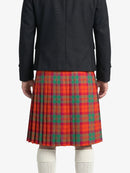 Person wearing a black jacket and red plaid kilt  on a white background