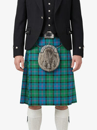 Person wearing a traditional Scottish kilt with a tartan pattern on a white background