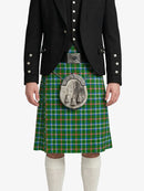 Person wearing a green plaid kilt with a black jacket on a white background