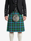 Person wearing a traditional Scottish kilt with a tartan pattern on a white background