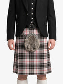 Person wearing a black jacket, plaid kilt, and sporran on a white background
