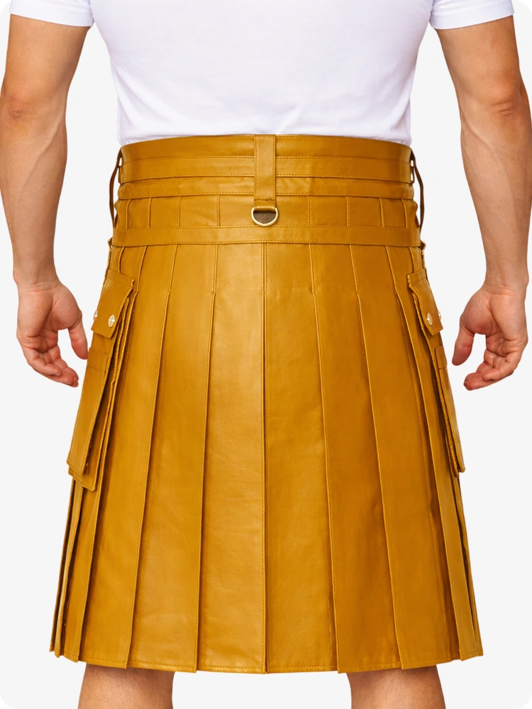 Person wearing a mustard yellow pleated skirt on a white background