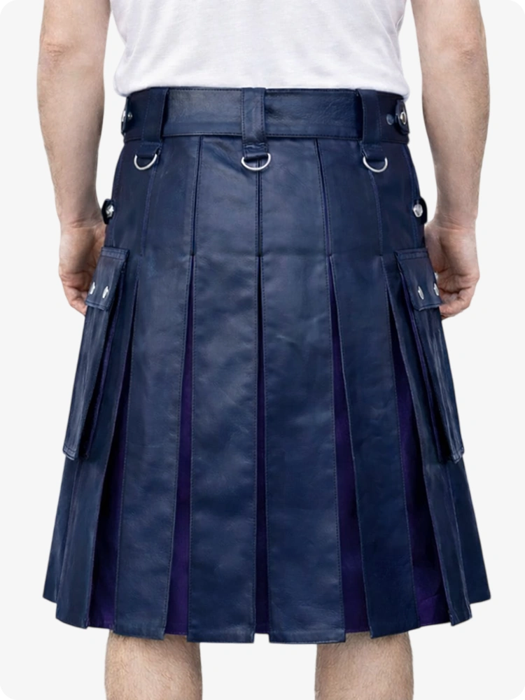 Person wearing a navy pleated kilt on a white background