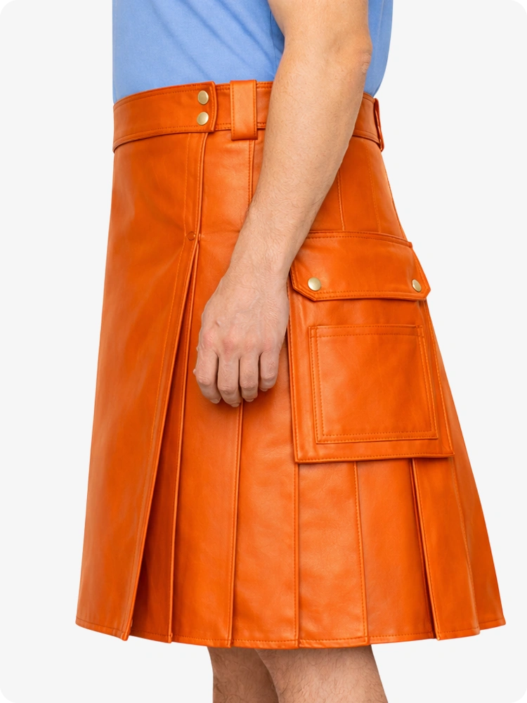 Orange leather skirt worn by a person on a white background