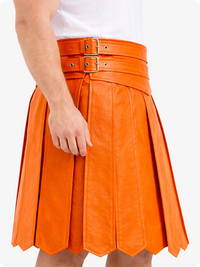 Orange leather skirt with a belt on a white background
