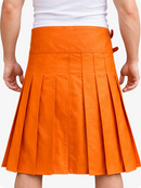 Orange pleated skirt worn by a person on a white background
