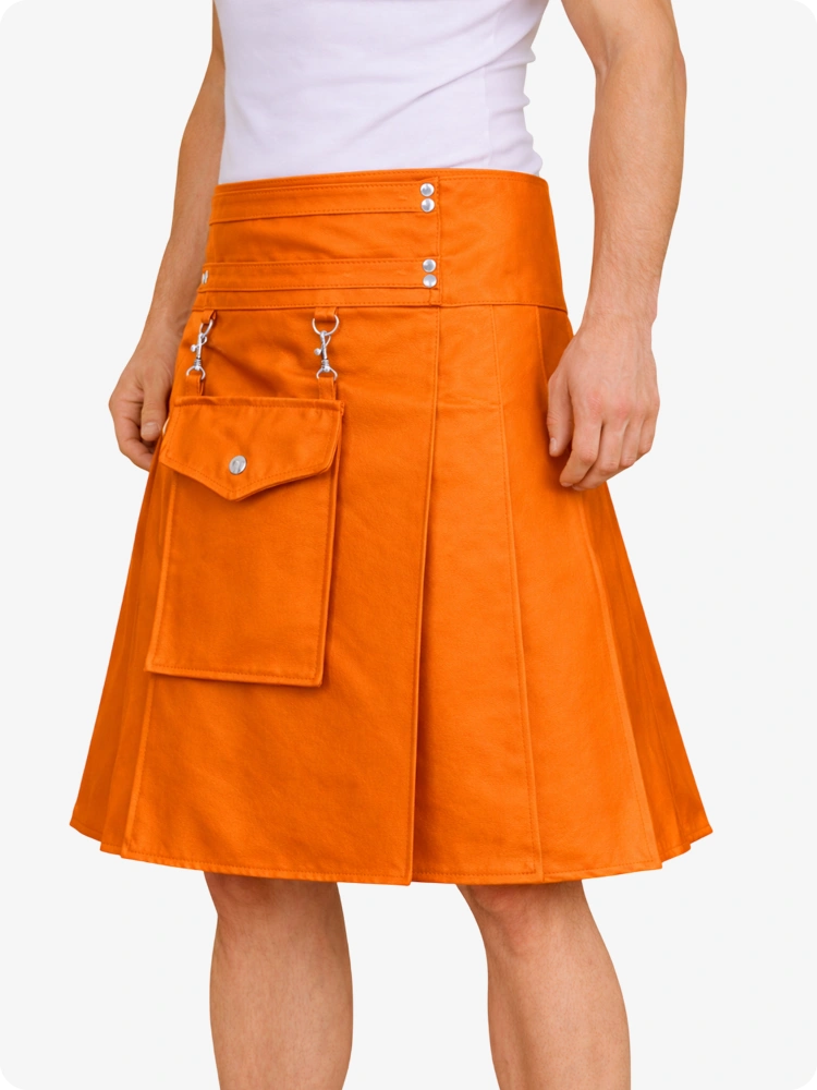 Orange skirt with silver zippers and buttons on a white background