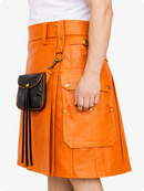 Orange leather kilt with a black pouch on a white background