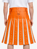Orange pleated skirt with white accents worn by a person on a white background