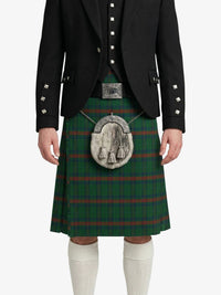 Person wearing a traditional Scottish kilt with a white background