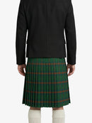 Person wearing a green plaid kilt with a black jacket on a white background