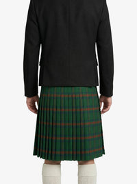 Person wearing a green plaid kilt with a black jacket on a white background