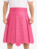 Person wearing a pink pleated skirt on a white background