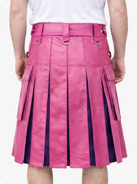 Pink pleated skirt with silver buckles on a white background