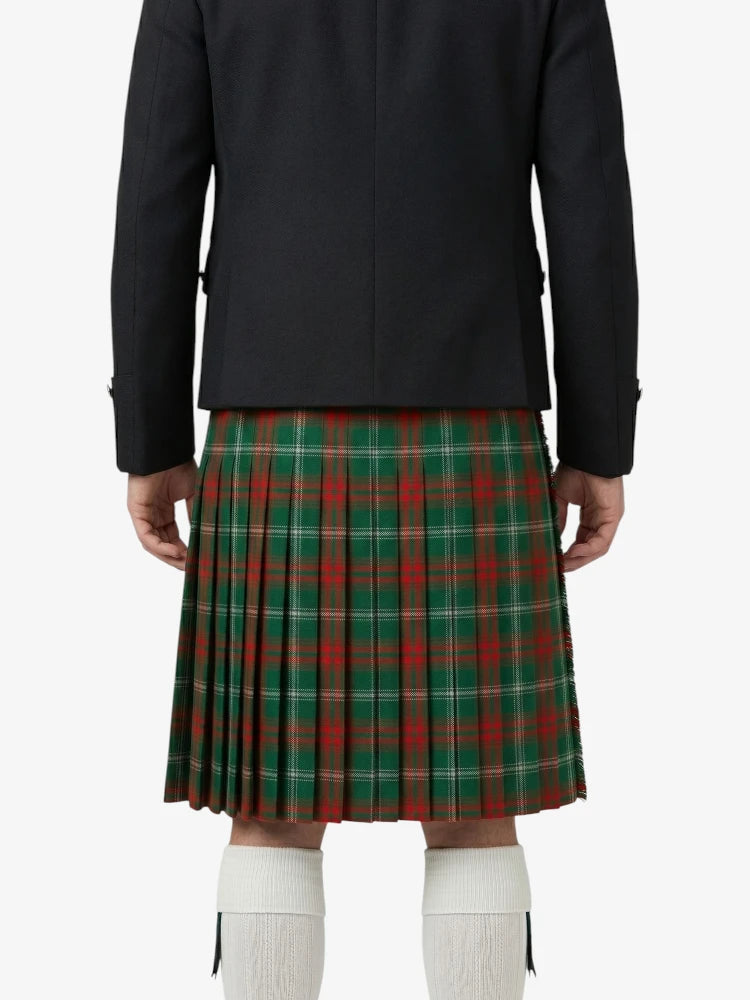 Person wearing a black coat and red plaid kilt on a white background