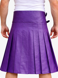 Purple pleated skirt worn by a person on a white background