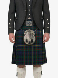 Person wearing a traditional Scottish kilt with a tartan pattern on a white background