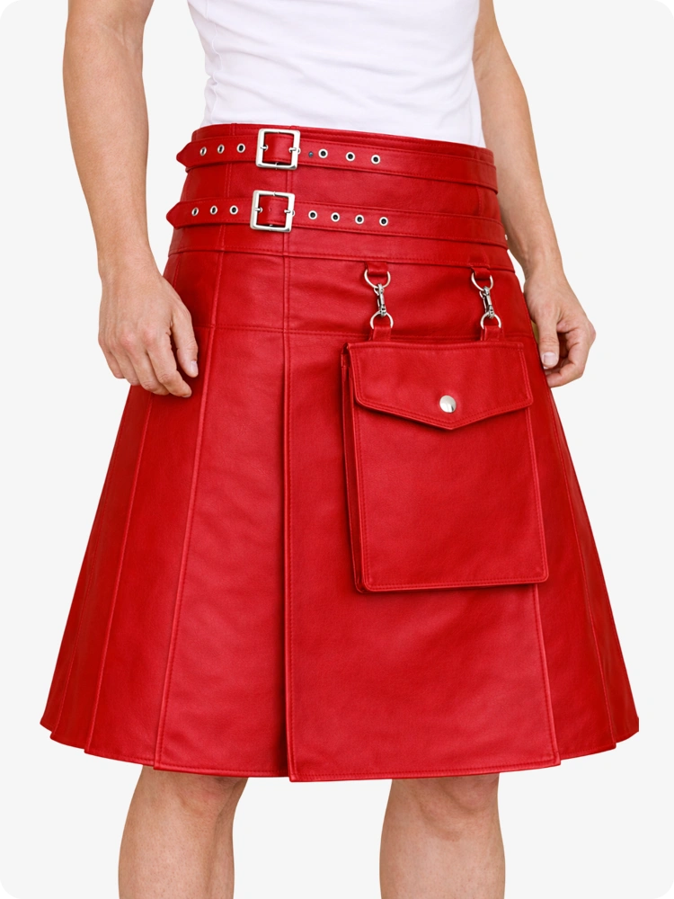 Red leather skirt with silver buckles and hardware on a white background