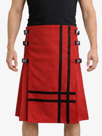 Red kilt with black straps worn by a person on a white background