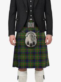 Person wearing a traditional Scottish kilt with a tartan pattern on a white background