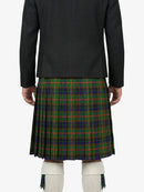Person wearing a black jacket and green plaid kilt on a white background