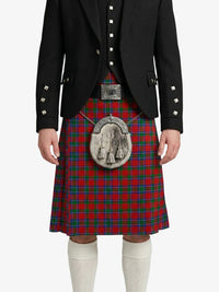 Person wearing a black jacket and red plaid kilt with a silver buckle on a white background