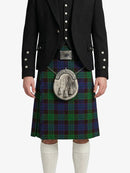Person wearing a black jacket and green plaid kilt with a silver sporran on a white background
