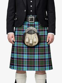 Person wearing a traditional Scottish kilt with a tartan pattern on a white background