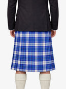 Person wearing a blue plaid kilt with a black jacket on a white background