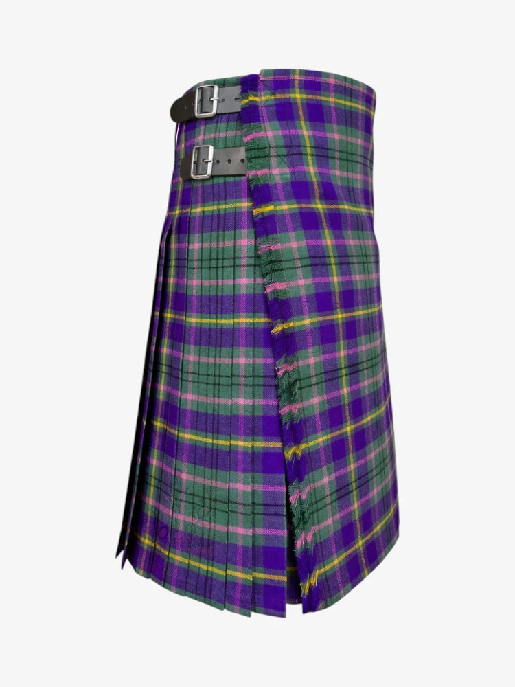 Plaid kilt with purple, green, and yellow pattern on a white background