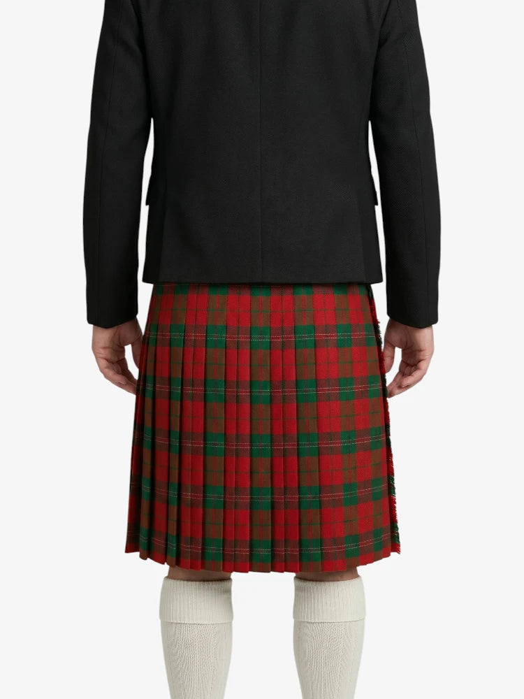 Person wearing a black jacket and red plaid skirt on a white background