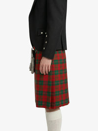 Person wearing a red plaid kilt with a black jacket on a white background