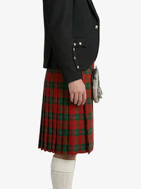 Person wearing a black jacket and red plaid kilt on a white background