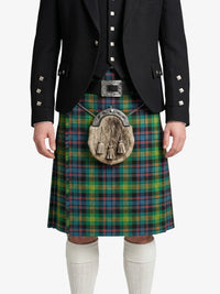 Person wearing a traditional Scottish kilt with a tartan pattern on a white background