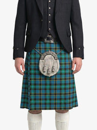 Person wearing a blue plaid kilt with a tartan sporran on a white background