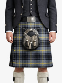 Person wearing a traditional Scottish kilt with a sporran on a white background