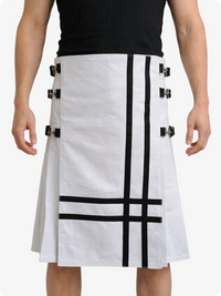 White skirt with black patterns and buttons worn by a person on a white background